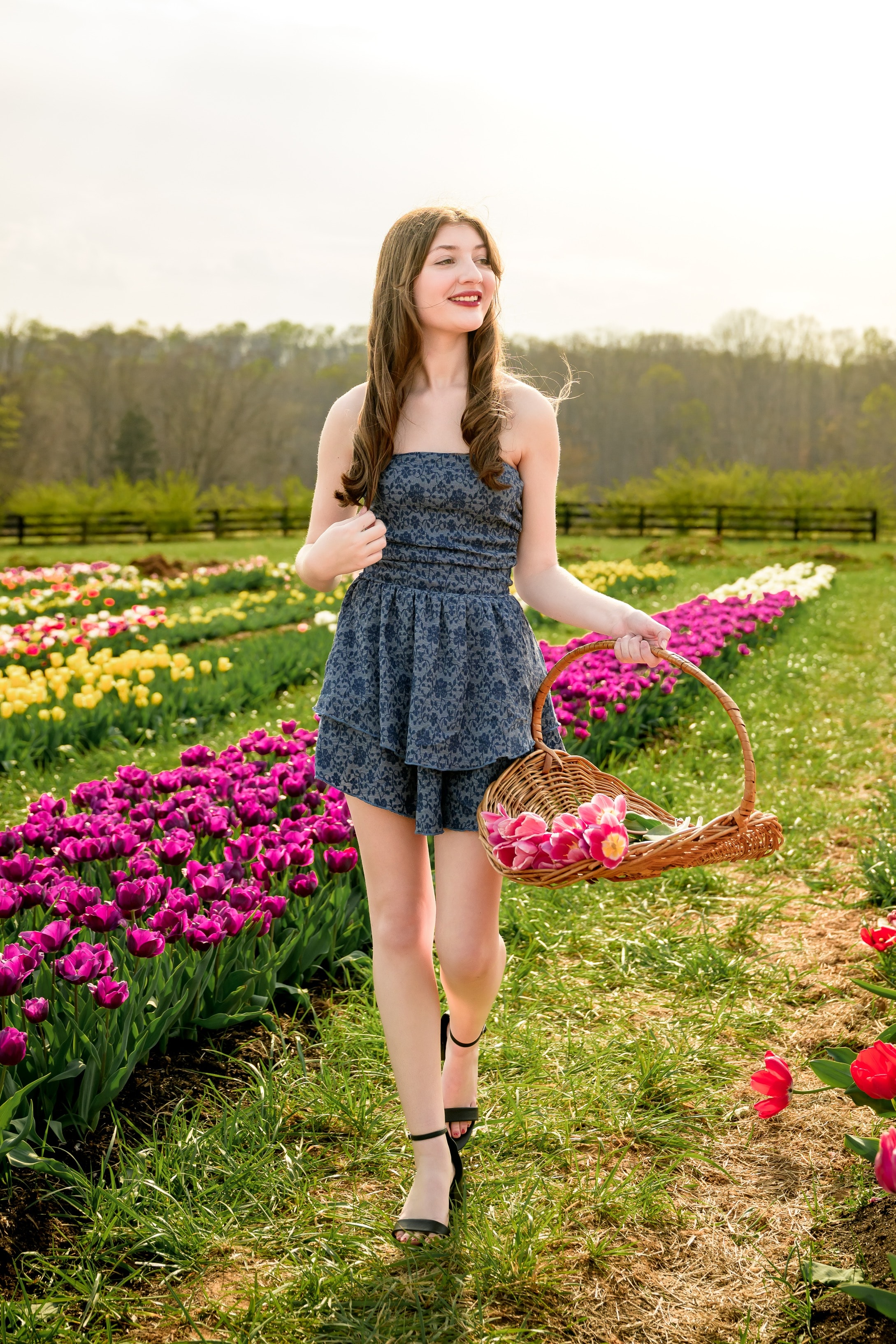 Savannah Lynn — gazing across tulip field with basket